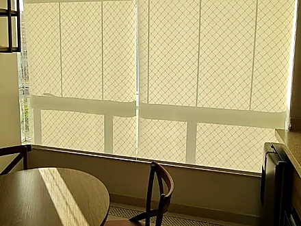 Varanda com persiana Tela Solar 1% instalada